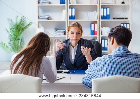 Young family dissappointed at high interest mortgage rate in bank