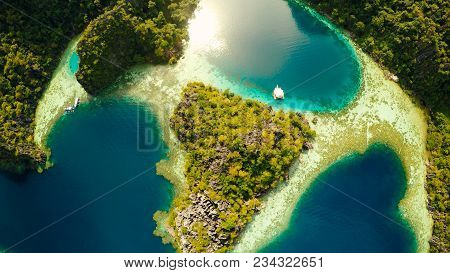 Coron, Palawan, Philippines, Aerial View Of Beautiful Twin Lagoon And Limestone Cliffs