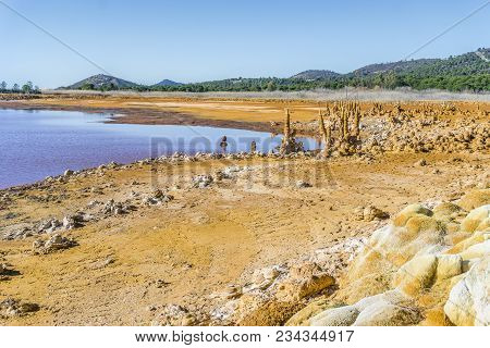 Gossan Reservoir With Orange Stalagmites On Shore, Huelva, Andalusia, Spain