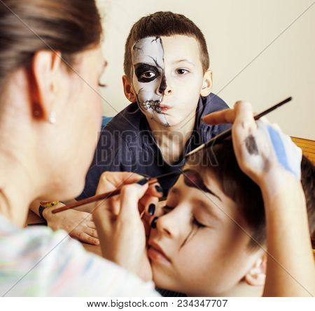 Little Cute Child Making Facepaint On Birthday Party, Zombie Apocalypse Facepainting, Halloween Prep