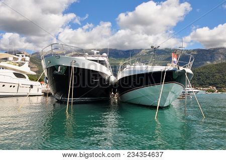 Luxury Yacts Moored At Marina. Beautiful Scenic Bay. Bright Sunny Day With Blue Sky And Mountains On