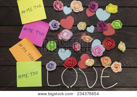 Sexual Harassment Concept. Top View Of Me Too Message Written In Colorful Note Papers On A Love Knot