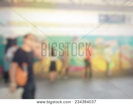Blurred Image Of People Line Up Waiting For Electric Sky Train Station, Railroad Transportation For 