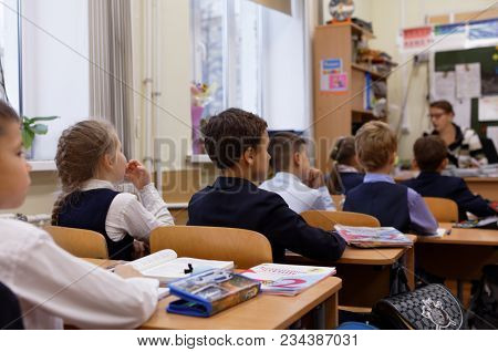 ST. PETERSBURG, RUSSIA - OCTOBER 16, 2017: Children in a classroom in primary school of the physics and mathematics lyceum 366. This year lyceum celebrates its 70th anniversary