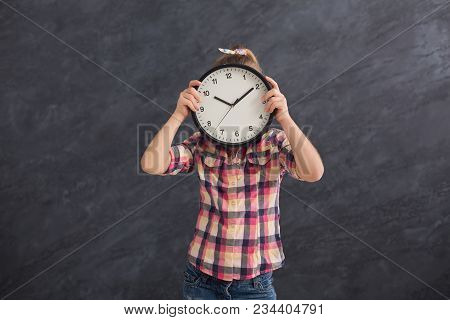Little Girl Holding Big Clock, Covering Her Face. Time Management, Deadline, Time To Study, School C
