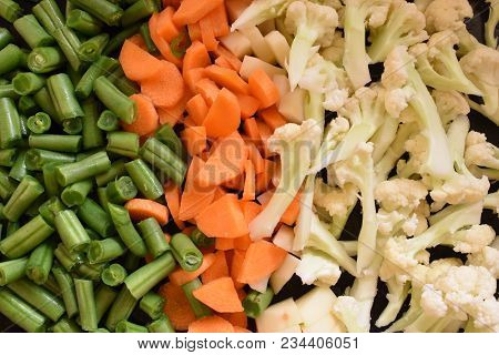 Mix Vegetable Like Carrot ,cauliflower, Potato,beans  At Kitchen After Cutting.