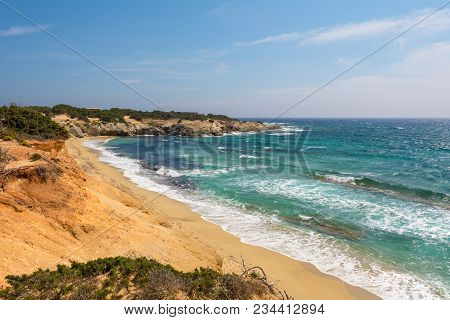 Cliff And View Of Sea With Sandybeach On Naxos Island. Cyclades, Greece