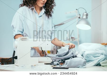 Cropped Photo Of Working White Sewing Machine. Useful Machine. Testing New Sewing Machine