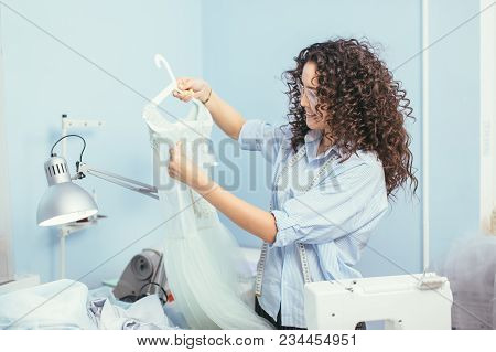 Tailor Had Created Ruffled Shirt At Workplace. Ready Shirt, Nightgown. Tailoring To Order