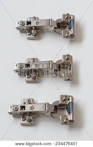 Three Door Hinges Used For Flat Pack Furniture Fixings