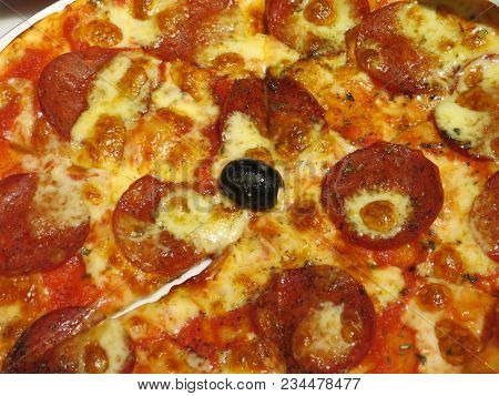 Italian Food Pepperoni Pizza On A Pan.