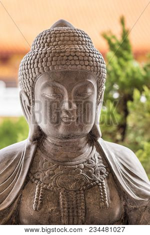 Hacienda Heights, Ca, Usa - March 23, 2018:  Closeup Of The Head Of Dark Gray Granite Statue Of The 