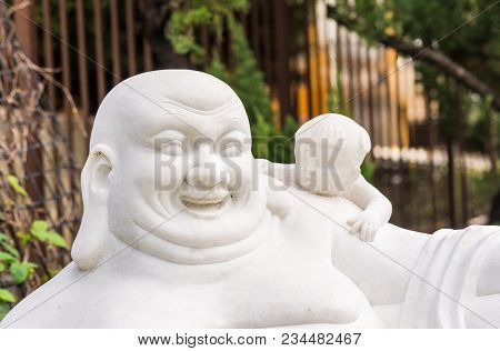 Hacienda Heights, Ca, Usa - March 23, 2018:  Closeup Of Head Of Feng Shui Laughing White Buddha With