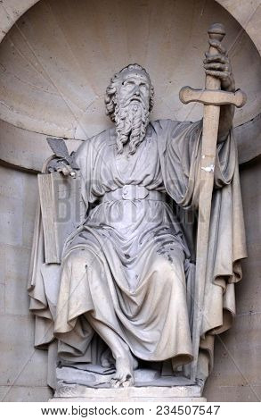 PARIS, FRANCE - JANUARY 04: Saint Paul the Apostle, statue on the portal of the Saint Sulpice Church, Paris, France on January 04, 2018.