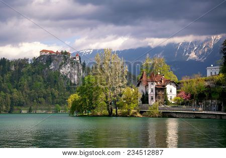 Scenic View Of Lake Bled - Popular Tourist Attraction In Julian Alps - With Castle, Villas And Mount