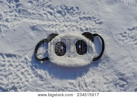 Cute Panda Mask On Snow At Winter In Mohe, China.
