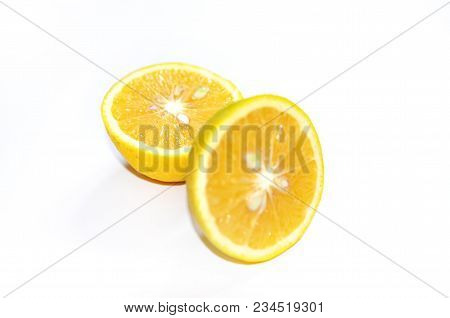 Slice Of Orange Over White Background, Sweet Lemon Isolated On White Background