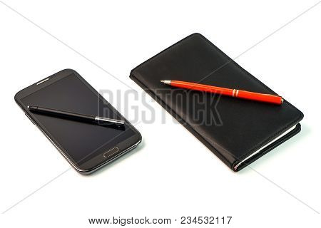 A Smartphone With A Stylus Pen And A Black Notebook With Red Pen On White Background