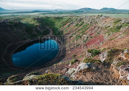 Beautiful Volcanic Lake Kerid And Green Hills In Iceland