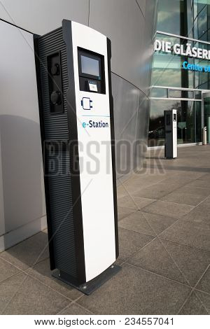 Dresden, Germany - April 2 2018: Electric Car Charging Station In Front Of The Volkswagen Glaserne M