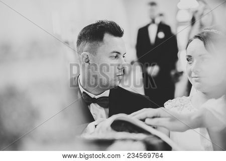 Wedding Couple Bide And Groom Get Married In A Church.