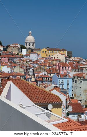 Lisbon, Portugal - July 2016: Colorful Houses In Lisbona And Dome Of National Pantheon Of Santa Engr