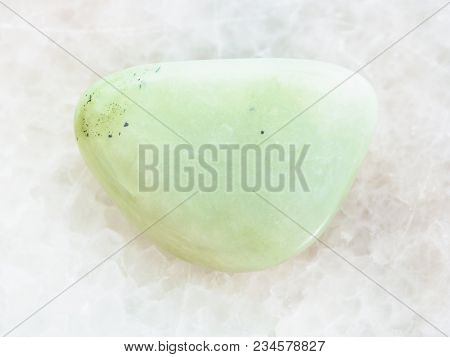 Macro Shooting Of Natural Mineral Rock Specimen - Tumbled Prasiolite (green Quartz) Gemstone On Whit