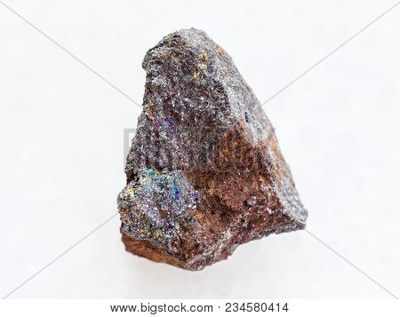 Macro Shooting Of Natural Mineral Rock Specimen - Magnetite (iron Ore) Stone On White Marble Backgro