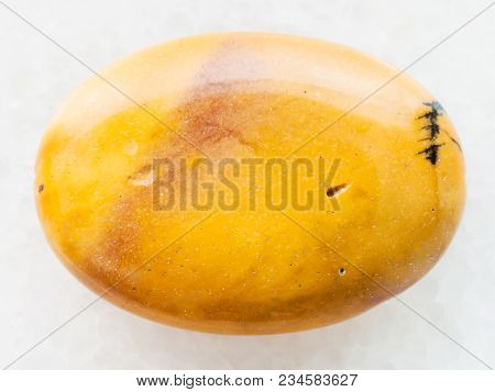Macro Shooting Of Natural Mineral Rock Specimen - Cabochon From Yellow Mookaite (mookaite Jasper) Ge