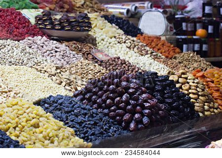 Counter With Nuts And Dried Fruits On The Market.
