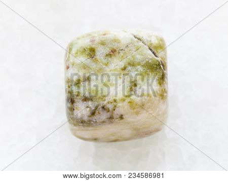 Macro Shooting Of Natural Mineral Rock Specimen - Polished Agate Gem Stone On White Marble Backgroun