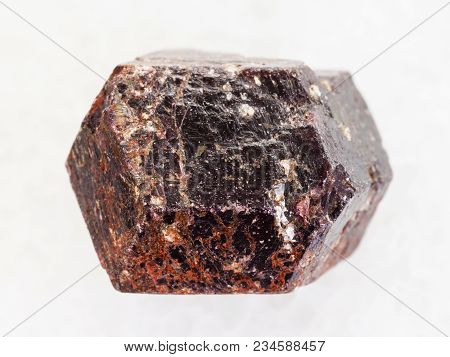 Macro Shooting Of Natural Mineral Rock Specimen - Raw Crystal Of Dravite Tourmaline Gemstone On Whit