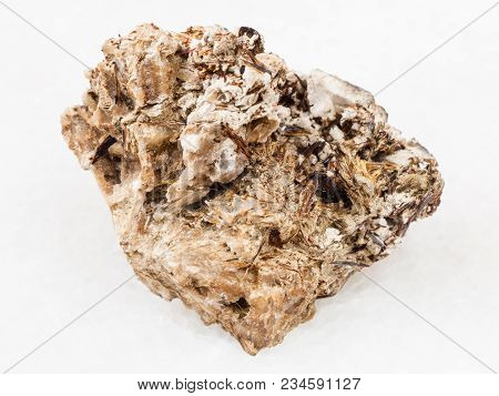 Macro Shooting Of Natural Mineral Rock Specimen - Brown Astrophyllite Crystals In Natrolite Stone On