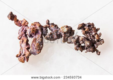 Macro Shooting Of Natural Mineral Rock Specimen - Raw Native Copper On White Marble Background From 