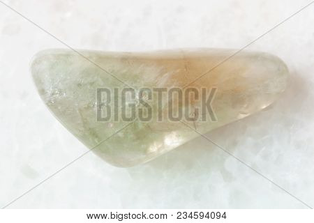 Macro Shooting Of Natural Mineral Rock Specimen - Polished Prasiolite (green Quartz) Gemstone On Whi