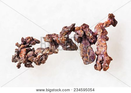 Macro Shooting Of Natural Mineral Rock Specimen - Rough Native Copper On White Marble Background Fro