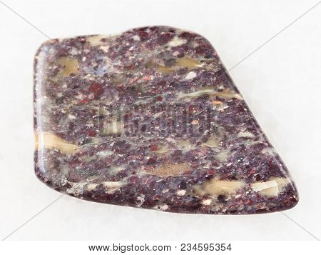 Macro Shooting Of Natural Mineral Rock Specimen - Polished Alunite Stone On White Marble Background 