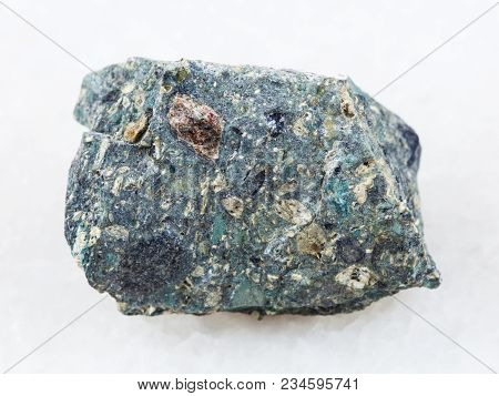 Macro Shooting Of Natural Mineral Rock Specimen - Raw Kimberlite Stone On White Marble Background