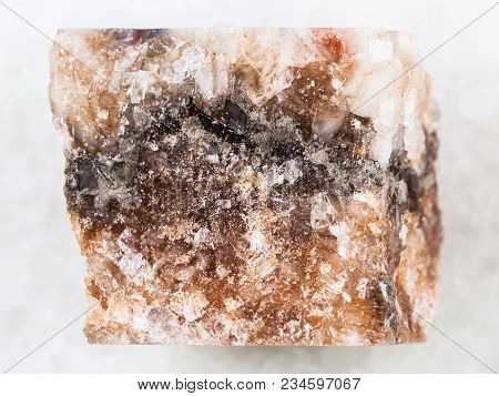 Macro Shooting Of Natural Mineral Rock Specimen - Raw Rock Salt Halite On White Marble Background Fr