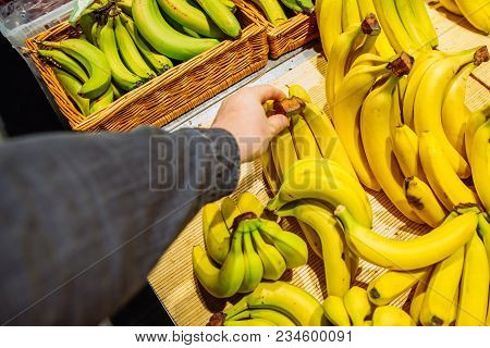 First-person View. Man Takes Bananas In Store. Grocery Shopping Concept