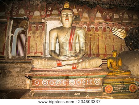 DAMBULLA SRI LANKA - DEC 27, 2016: Buddha statues inside Dambulla Cave Temple. Cave Temple is a World Heritage Site near Dambulla city on Dec 27, 2016. Sri Lanka.