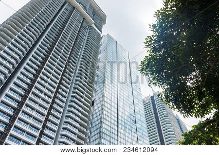 Low Angle View Of Modern Skyscrapers In Kuala Lumpur, Malaysia