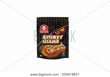 Dnipro, Ukraine - March 23, 2018: Plastic Doypack Bag With White Sesame Standing Up On White Backgro