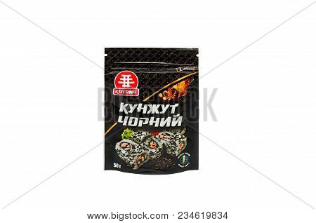 Dnipro, Ukraine - March 23, 2018: Plastic Doypack Bag With Black Sesame Standing Up On White Backgro