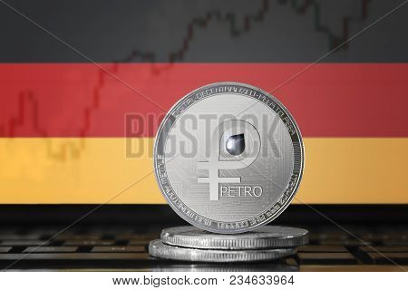 Petro (ptr) Cryptocurrency; Coin El Petro On The Background Of The Flag Of Germany; National Venezue