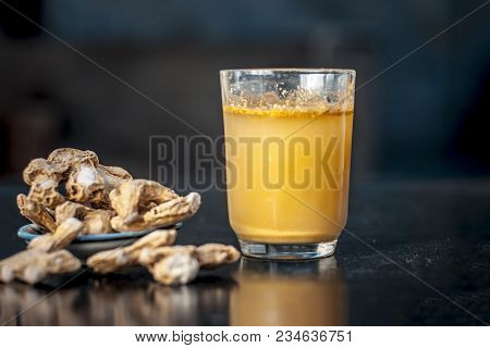 Dried Ginger Or Zingiber Officinale Or Soth,sonth With Ayurvedic Medicinal Extracted Juice In A Tran