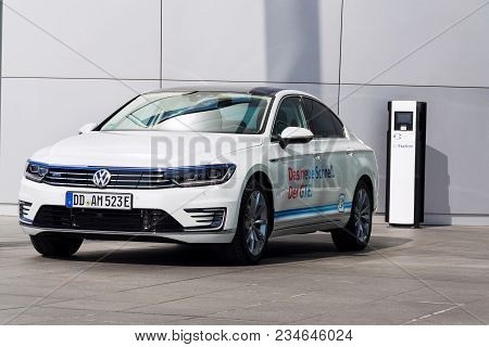 Dresden, Germany - April 2 2018: Plug-in Hybrid Electric Car Volkswagen Golf Gte Stands By Charging 