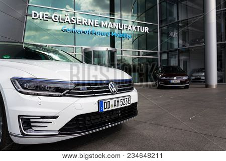 Dresden, Germany - April 2 2018: Plug-in Hybrid Electric Car Volkswagen Golf Gte Stands By Charging 