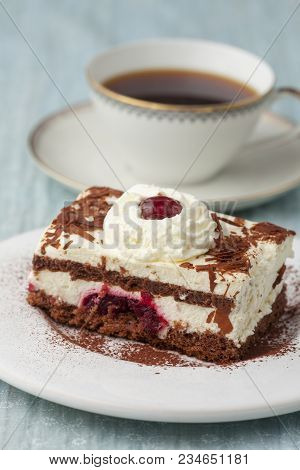 Black Forrest Cake On A Plate With Coffee