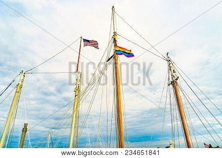 Two Flags On Yachts Masts In Provincetown' Marina, Massachusetts
